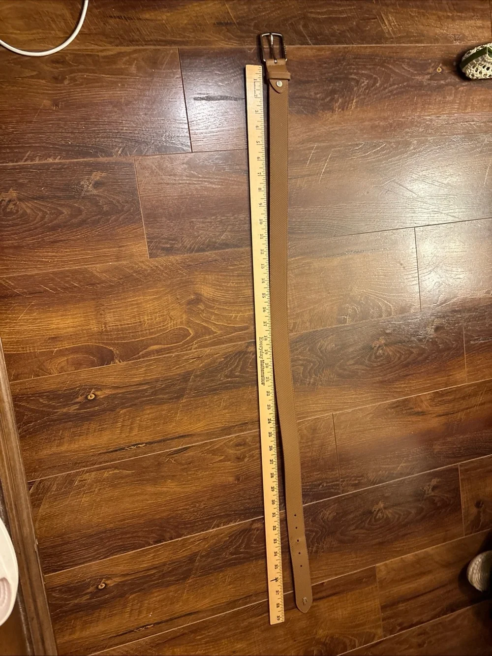 Tan Lacoste belt with textured weave pattern size 36